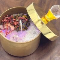 A Crown Chakra healing candle is designed to balance and align the spiritual center at the top of the head, promoting higher consciousness and self-awareness.